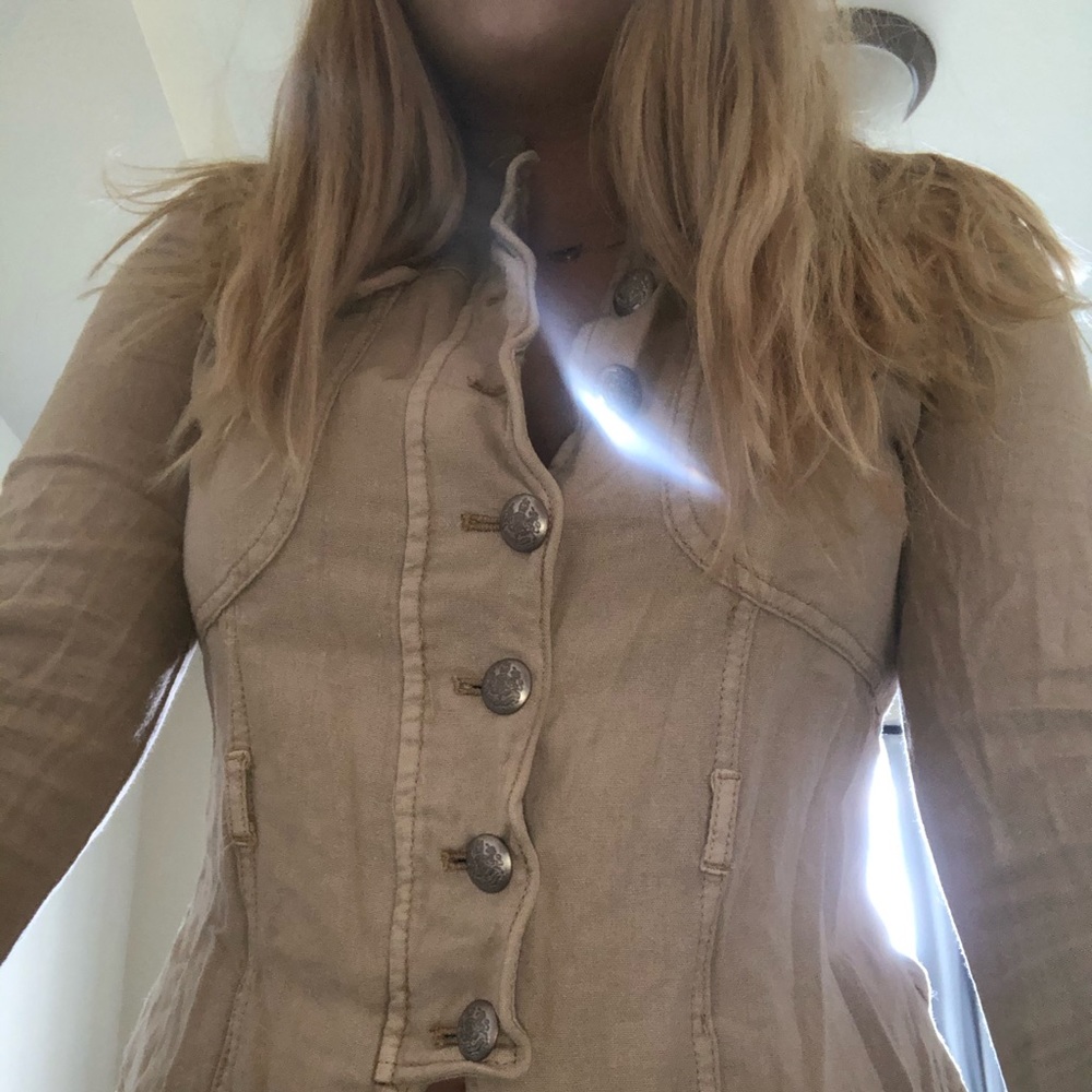 cream colored jacket